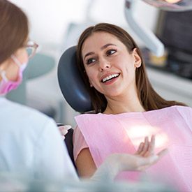 Smiling woman in dental chair