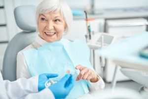 learning the difference between partial dentures and dental bridges