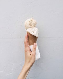 Woman holding ice cream cone